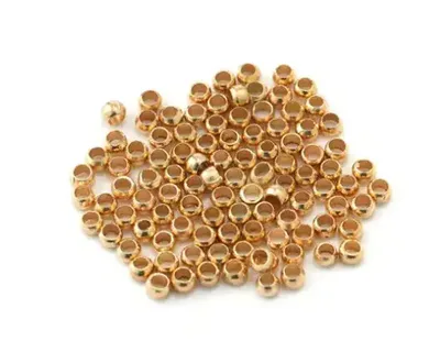 100 חרוזי מעיכה עגולים זהב <BR> 2 מ"מ